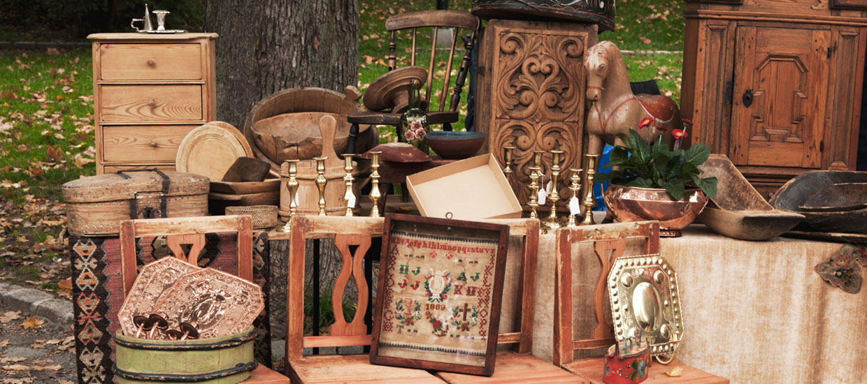 outdoor display of variety of antique items